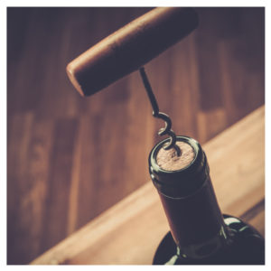 Bottle with a vintage cork screw